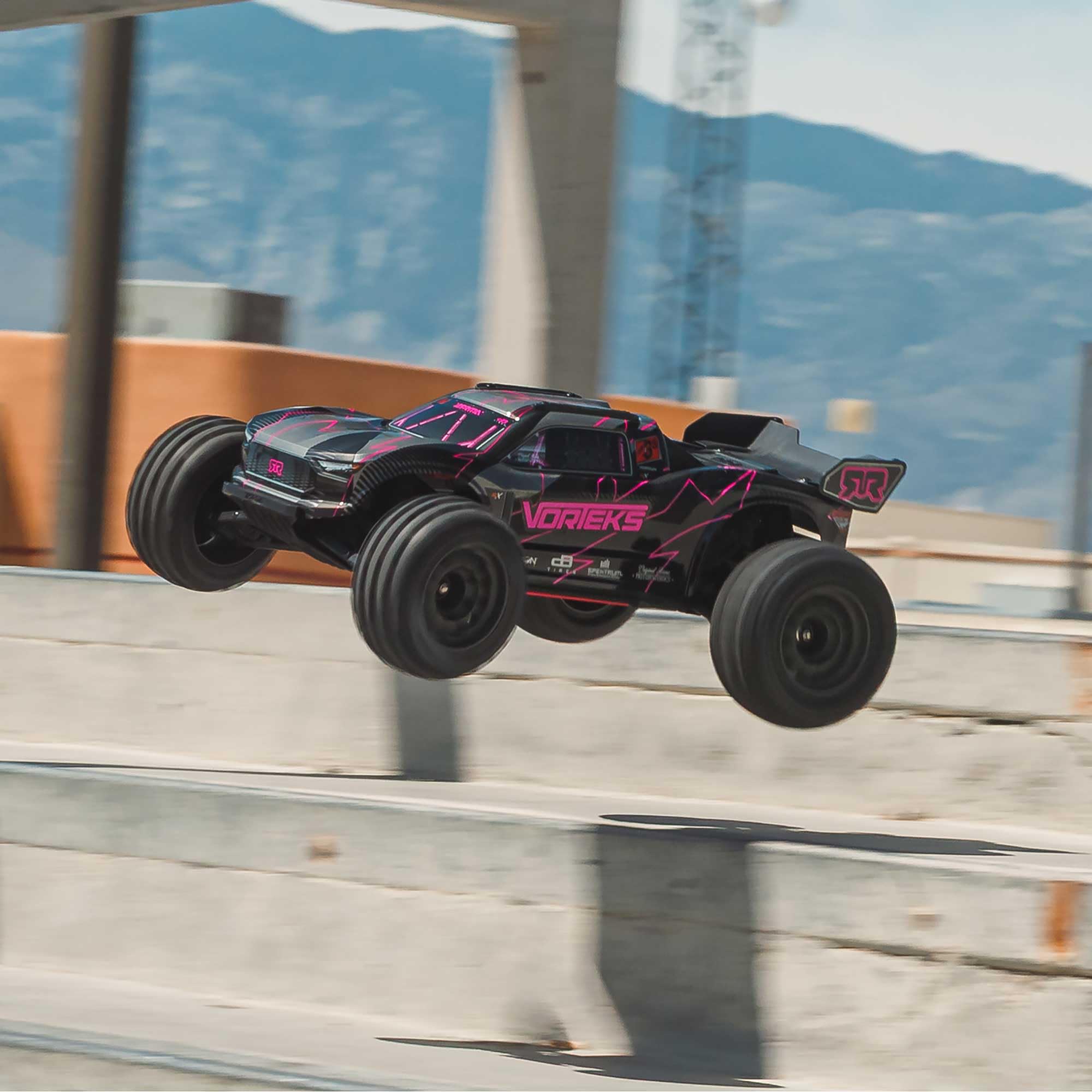 ARRMA Camión RC 1/10 VORTEKS 223S DSC 2WD RTR Camión Estadio sin escobillas, Rosa, (batería Lipo y Cargador no incluidos) ARA3505T3