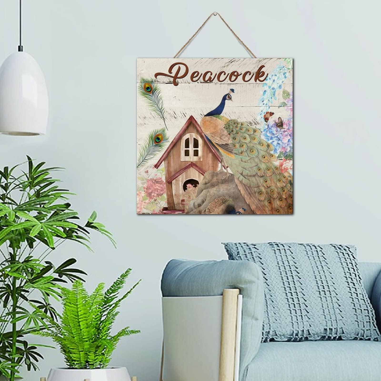 Décoration murale paon aquarelle pour créer une ambiance cottage dans votre salon