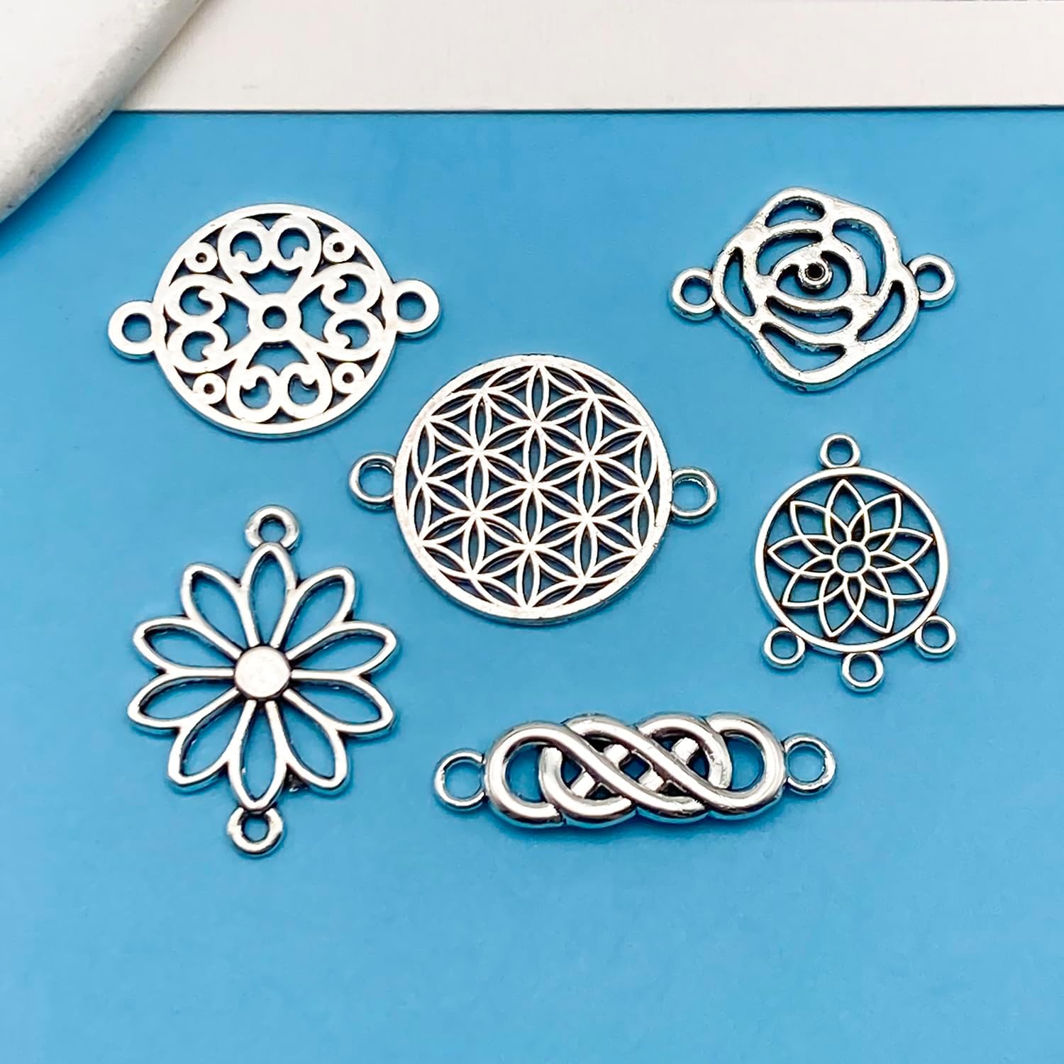 Youdiyla 90pcs Alloy antique silver hollow flower set series Pendant Jewelry Making DIY Keychain Earrings Pendant Various Design Charms for Jewelry Making Bracelets Necklace (SN44) - Image 6