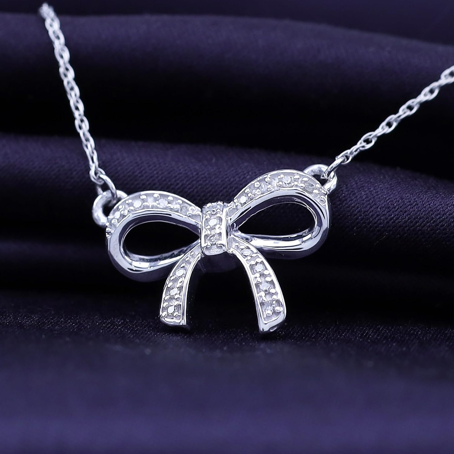 THE JEWEL ZONE Round Cut White Natural Diamond Accent Bow Pendant Necklace in Gold Over Sterling Silver – Elegant Ribbon Design, Jewelry for Women, 18" Chain Included