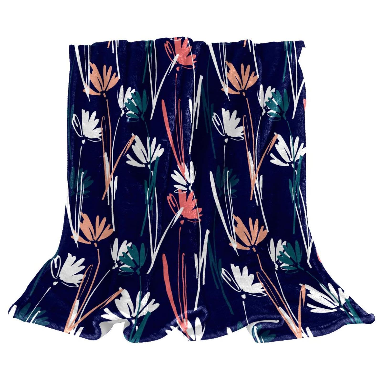 Couverture polaire fleur coloree pour soiree cocooning canape