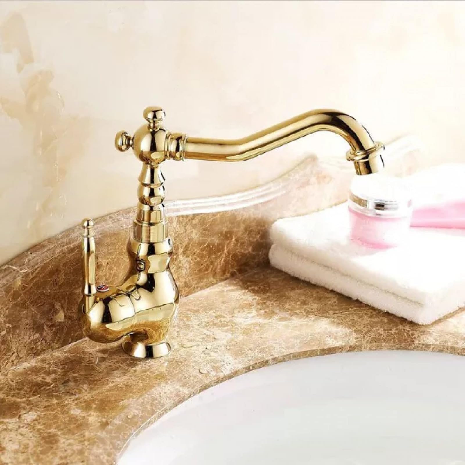 Grifo de baño de latón montado en cubierta de una sola manija chapada en oro
