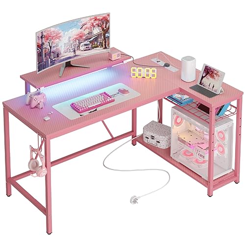 Bestier L-Shaped RGB Gaming Desk 132CM with Power Outlets & USB, Reversible Corner Setup with Shelves & Hooks, LED Workstation for Gaming Room or Small Space - 132.5CM - Carbon Fiber Pink