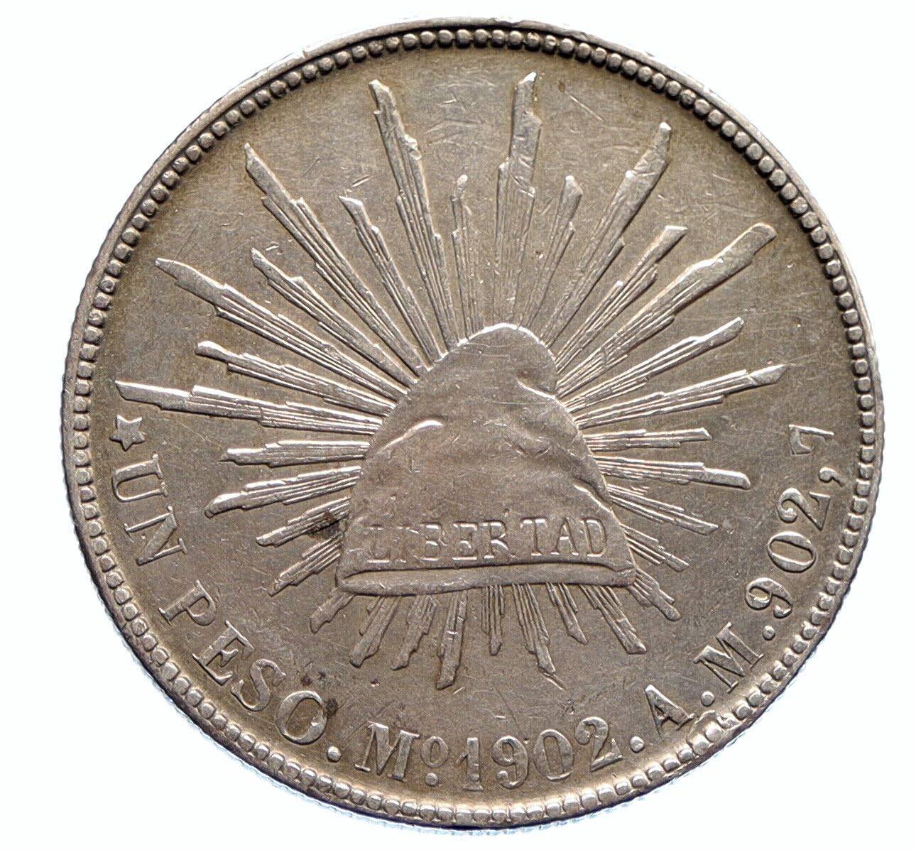 1898-1909 Mexican 1 Peso Silver Libertad "Liberty Cap" Coin. An Iconic Attractive Coin With Mexico National Symbols. 1 Peso (Silver Dollar) By Seller Circulated Condition