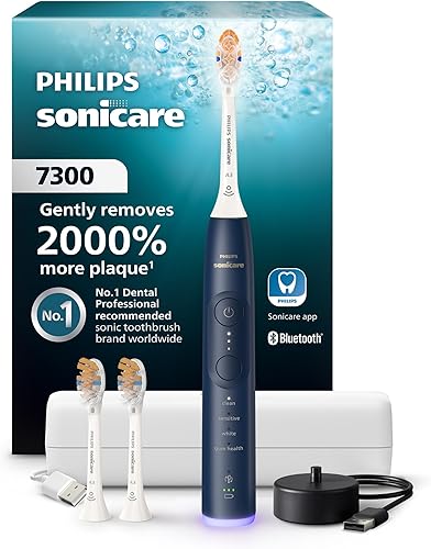 Philips Sonicare 7300 Series Electric Toothbrush - Next-Generation Sonicare Technology, Pressure Sensor, 12 Brushing Settings, SmarTimer, 21-Day Runtime, Travel Case, Navy Blue, HX7423/05