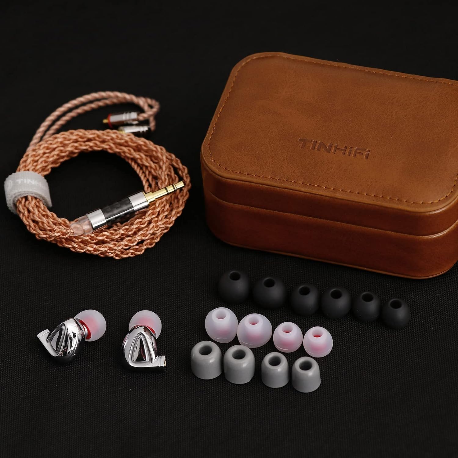 All components of Linsoul TINHIFI P1 Plus: earphones, cable, ear tips, and leather case