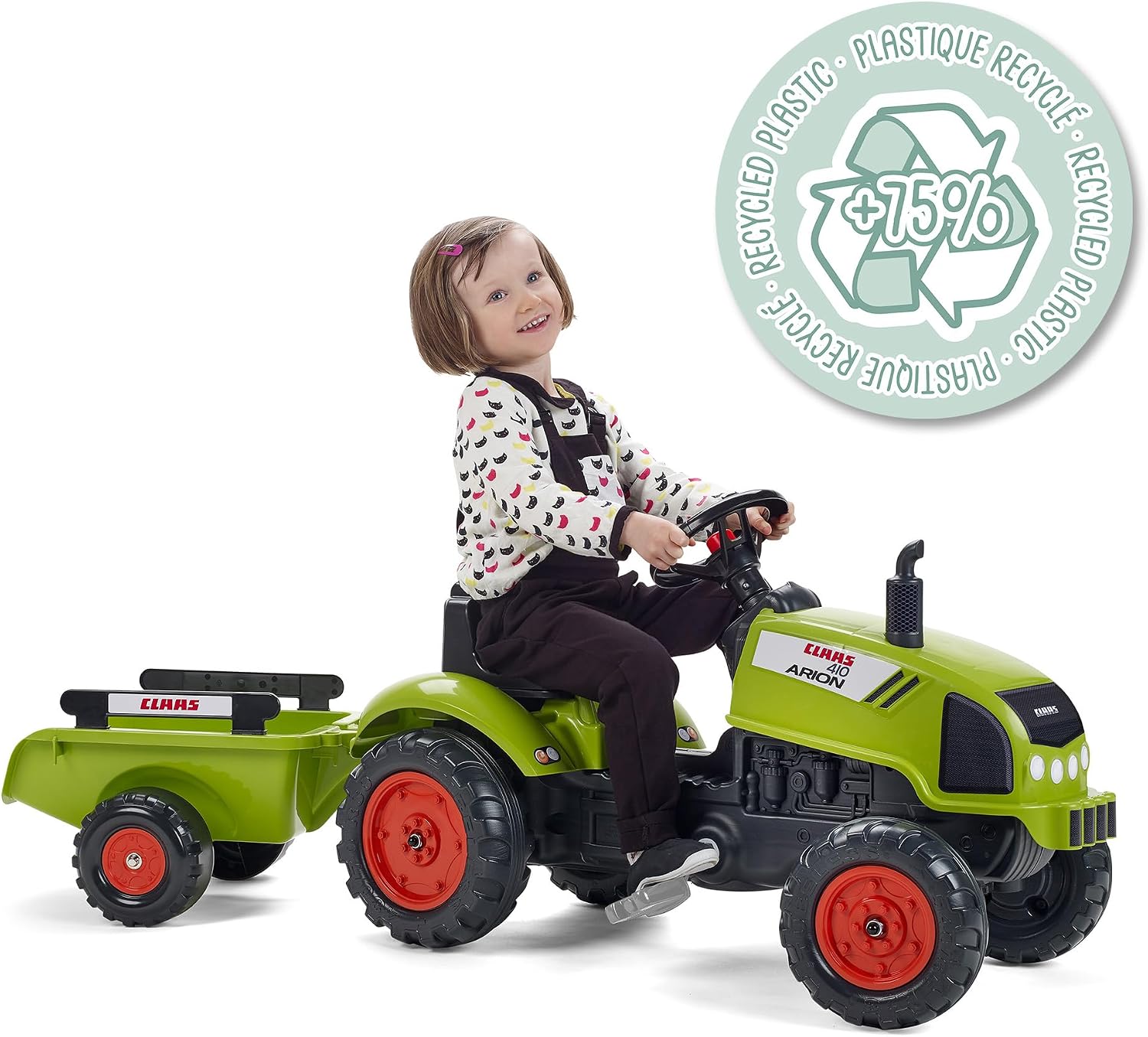 Young child riding the Falk Claas pedal tractor, with a 'Recycled Plastic +75%' logo.