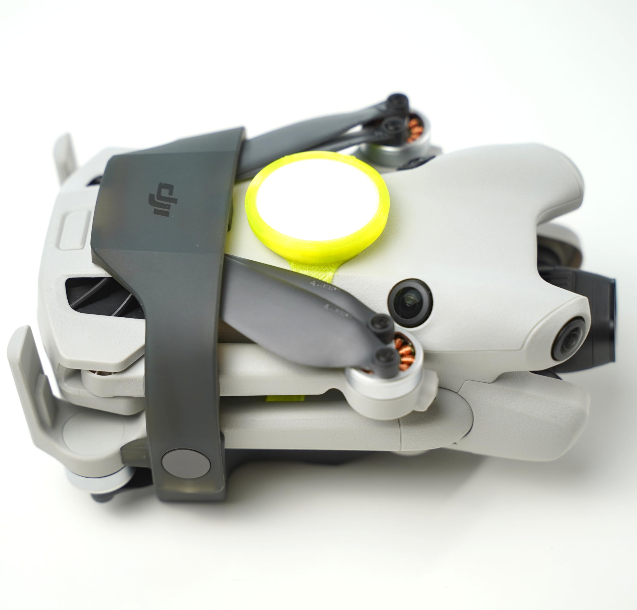 Uchwyt AirTag pasujący do drona DJI Mini 3 i Mini 4 Pro, (mocowanie pasuje do Airtag) (Mini 3 / Mini 4 Series, żółty)