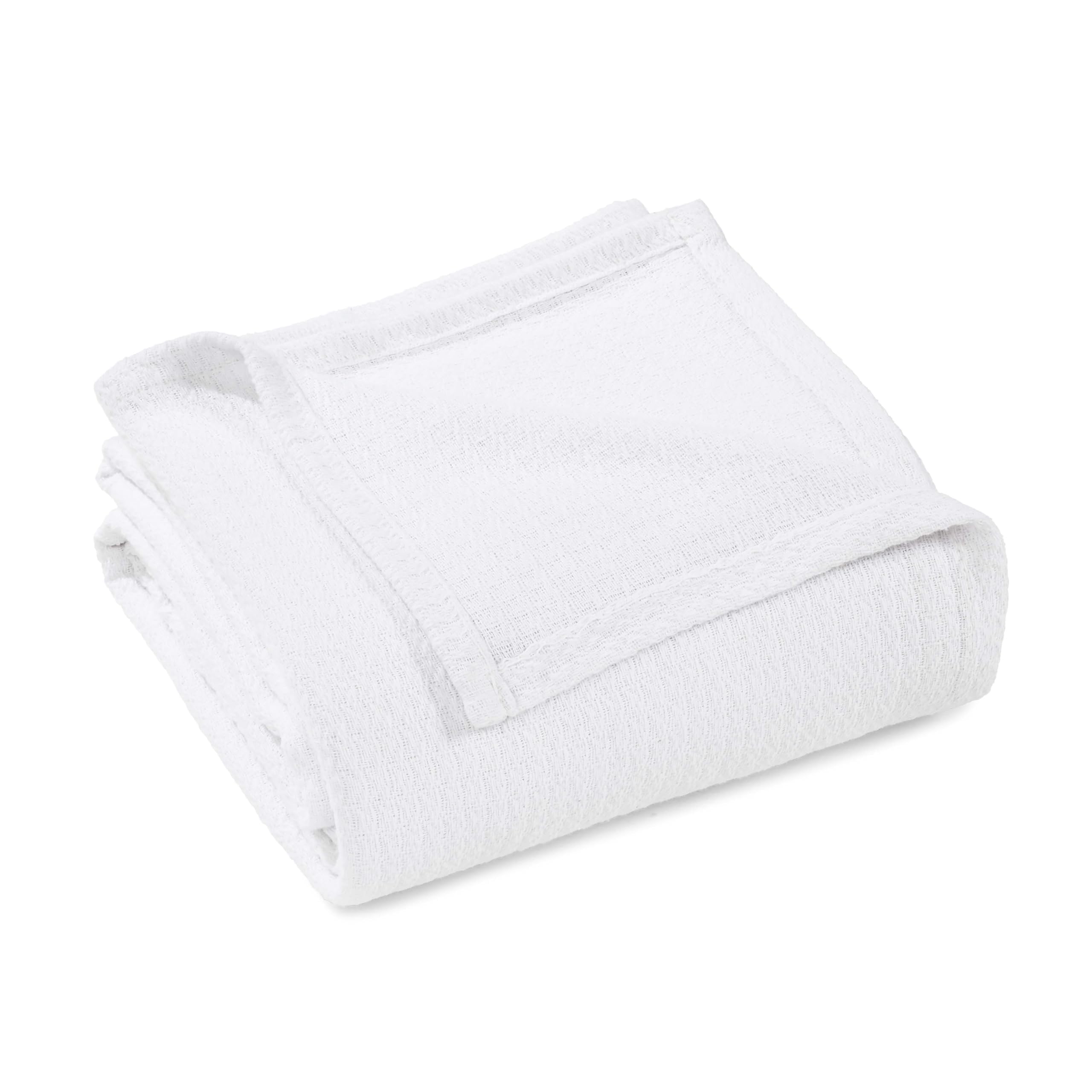 Couverture en coton gaufré contre les nuits trop chaudes au lit