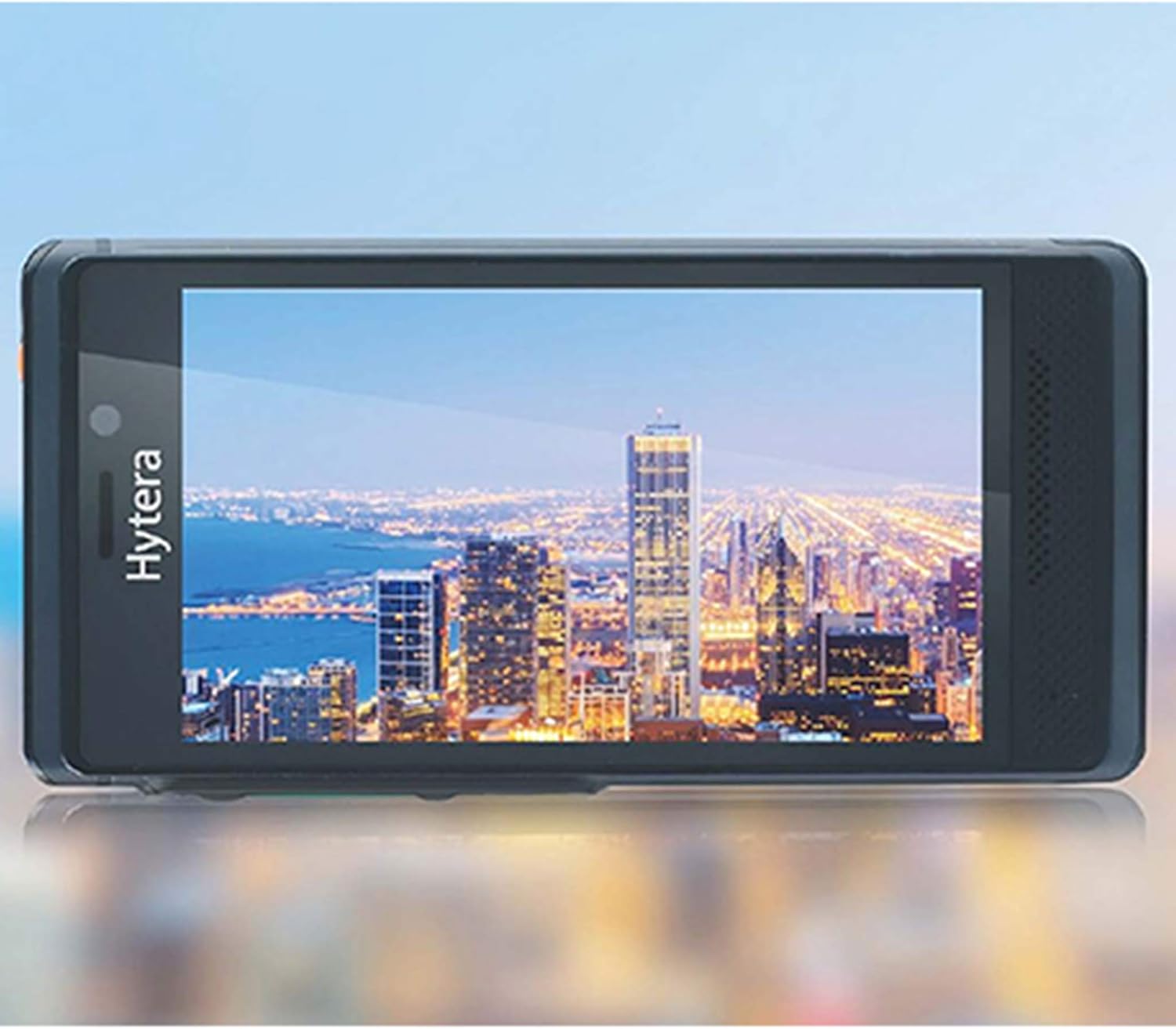 Hytera PNC550 in landscape mode displaying a city skyline on its screen
