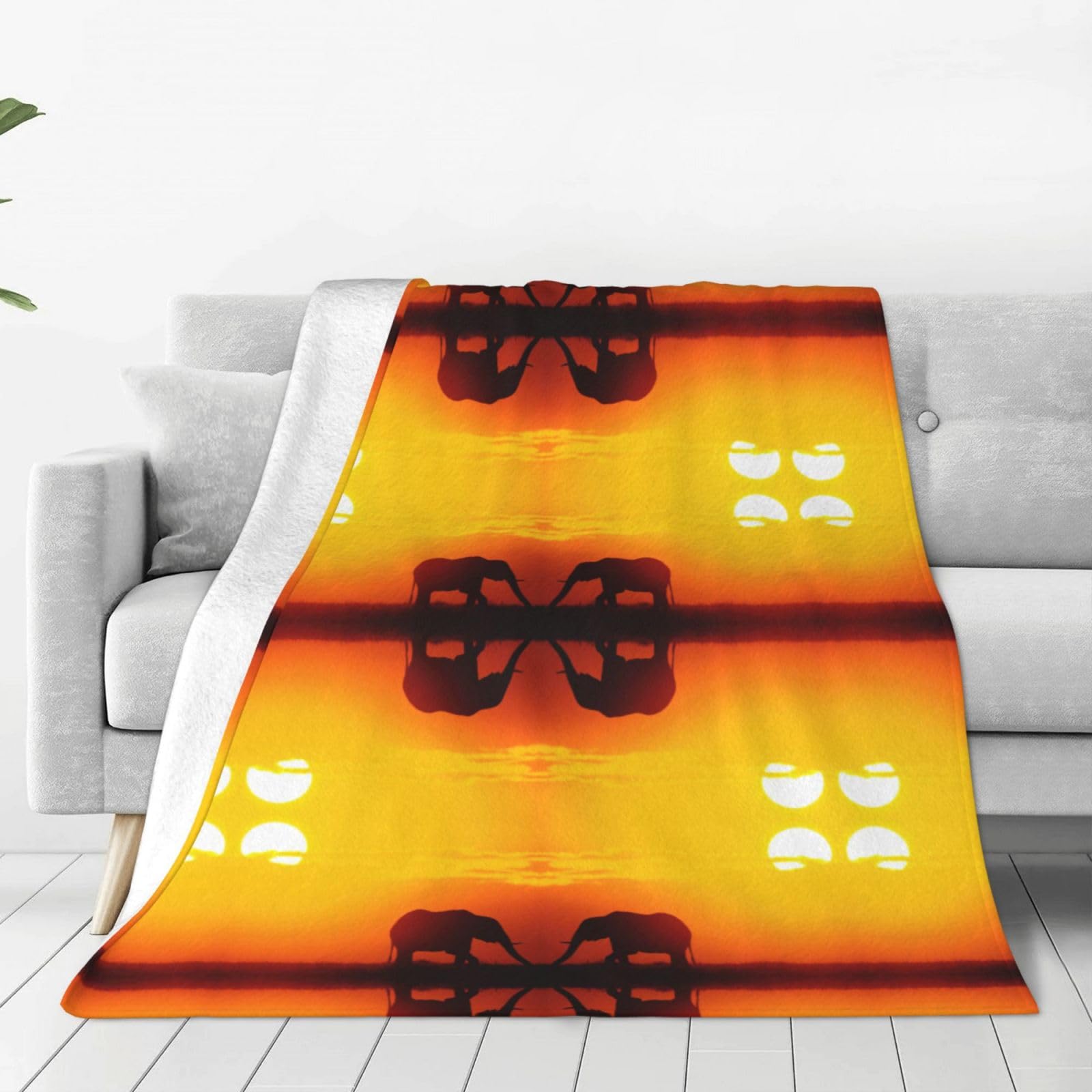 Couverture micro-polaire éléphant chaude pour vos soirées cocooning sur le canapé