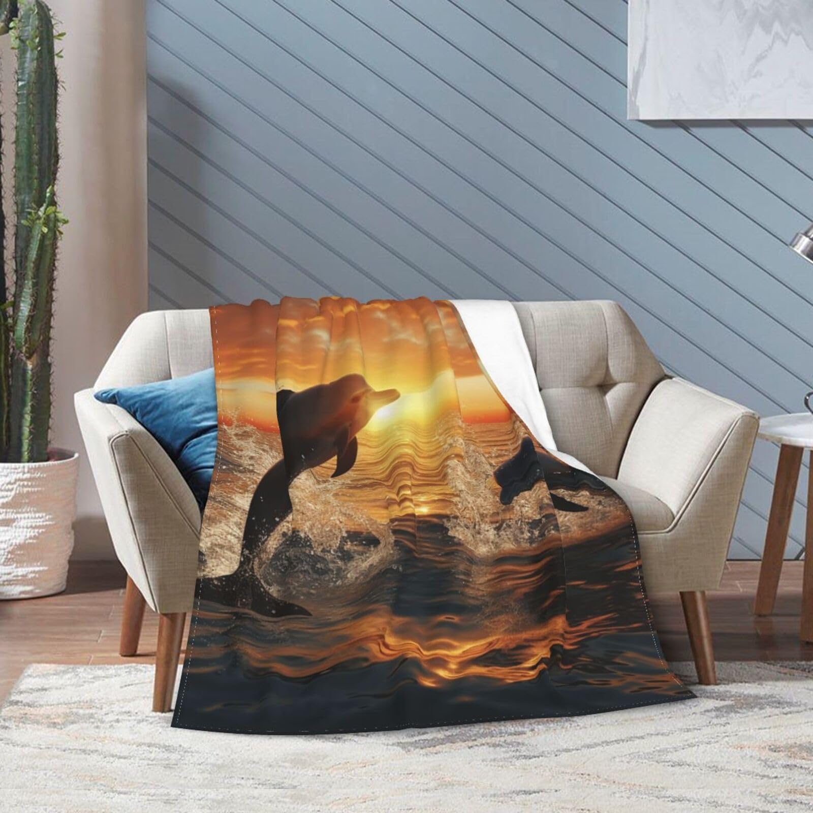 Couverture lit ou canapé motif dauphin : la solution anti-froid légère et douce pour l'hiver