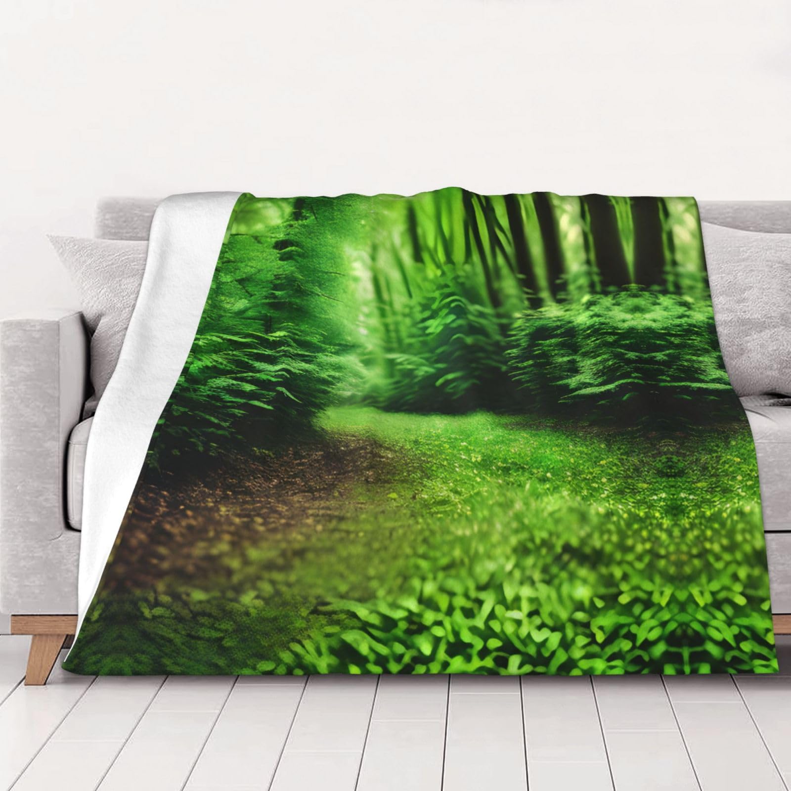 Couverture polaire verte pour des soirées cocooning douillettes sur le canapé
