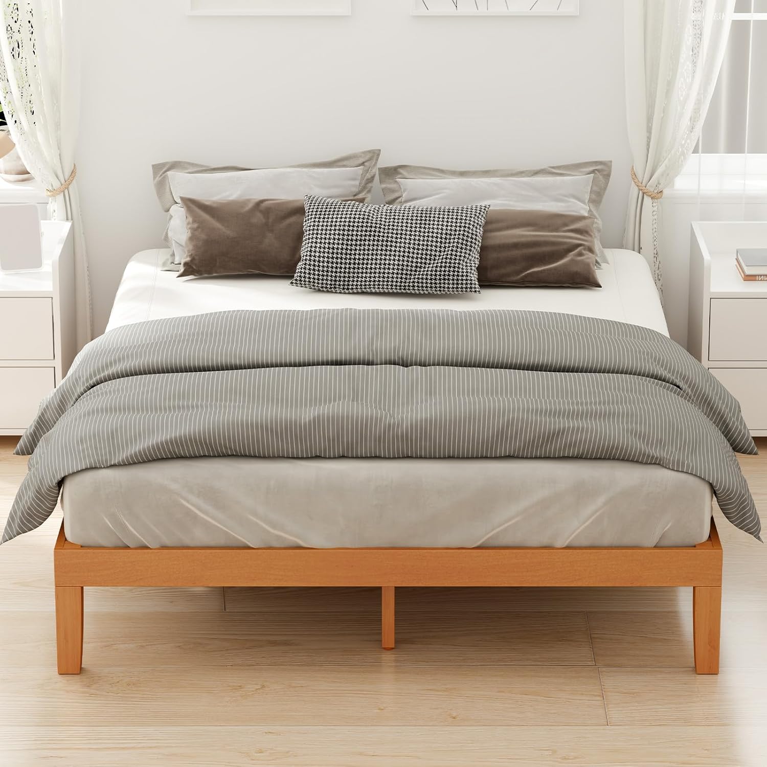Side view of the bed frame with mattress and bedding