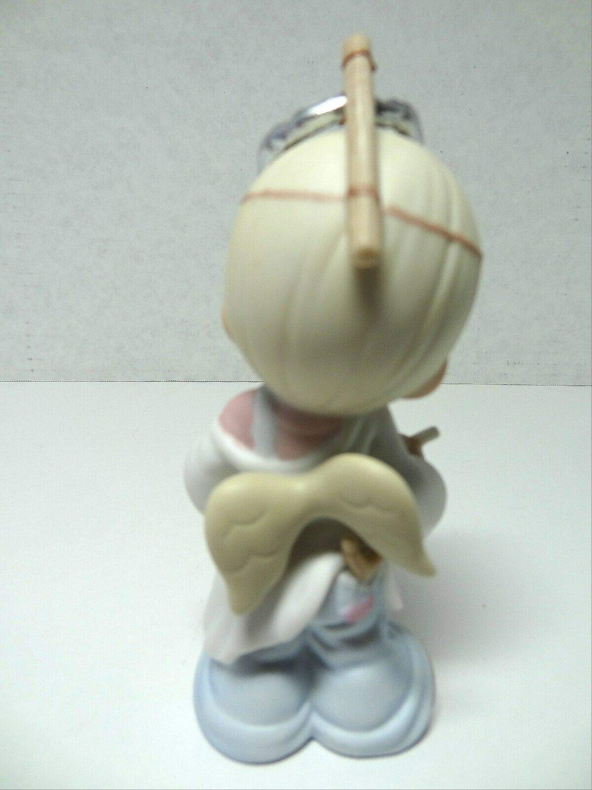 Amazon.com: Precious Moments Figurine - Peace On Earth