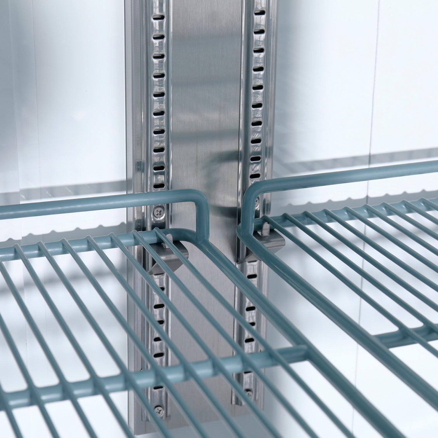 Close-up of a wire shelf and its attachment point to the interior rail