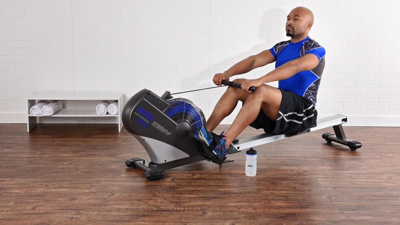 Man using Stamina ATS Air Rower
