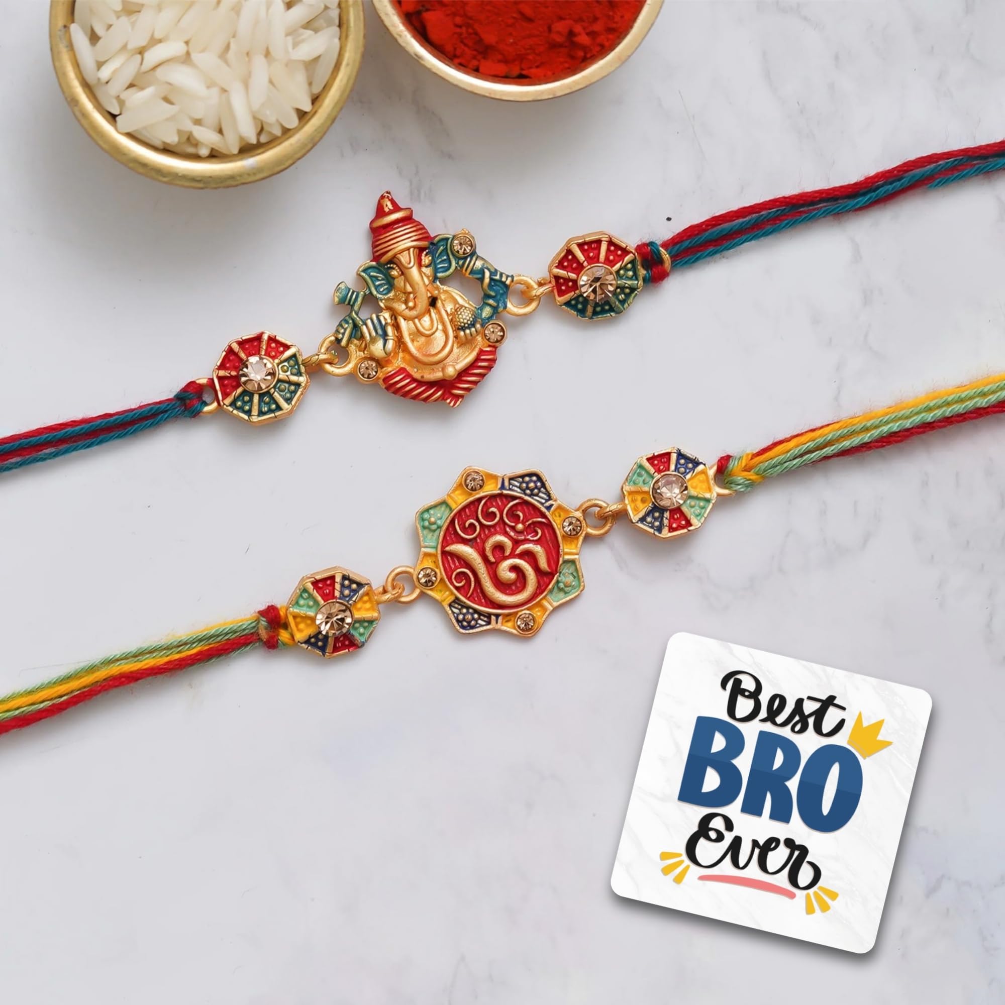 eCraftIndia Set of 2 Multicolor Ganesha and Om Symbol Religious Designer Rakhis, Best Bro Ever Fridge Magnet with Roli Chawal Pack - Rakhis for Brothers