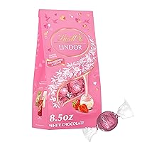 Vista 12 de Lindt LINDOR Trufas de caramelo de chocolate blanco, chocolate blanco con centro de trufa suave y derretida, bolsa de 5.1 onzas