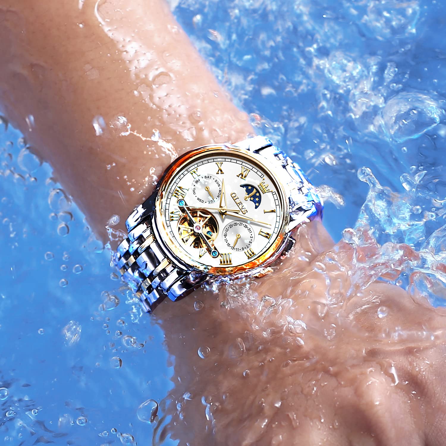 OLEVS Orologi automatici da uomo con scheletro meccanico di lusso in acciaio inox impermeabile luminoso orologio da polso Quadrante bianco e cinturino in argento dorato.