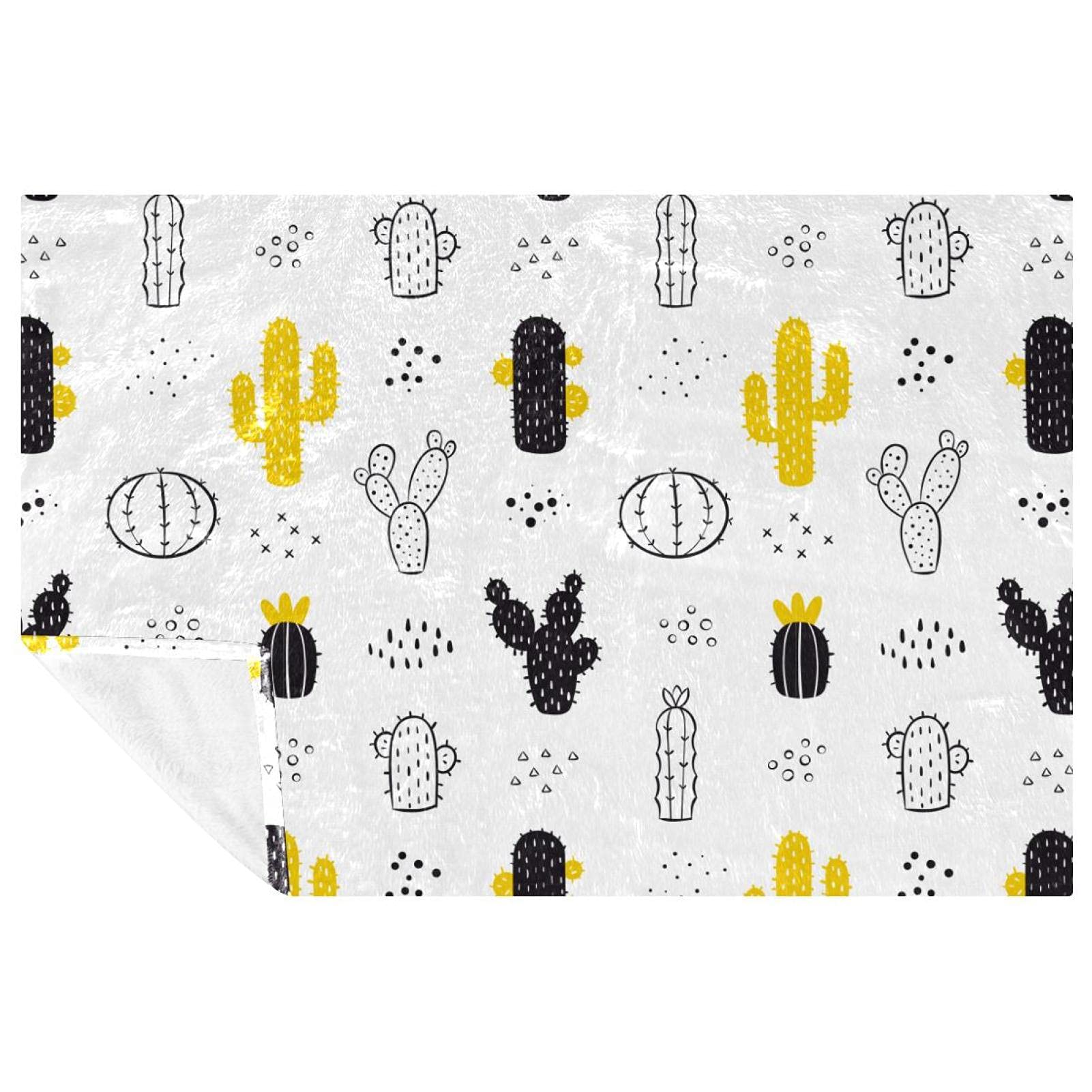 Couverture chaude cactus contre le froid sur le canapé et en camping