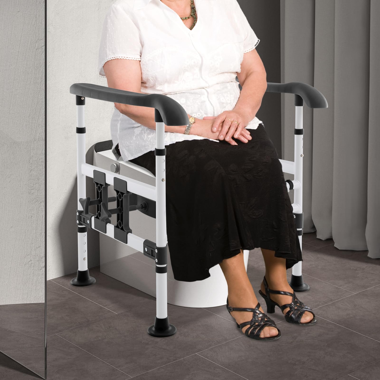 Pomoc przy wstawaniu toalety do 150 kg, regulowana szerokość i wysokość 57-61 cm/63-74 cm, antypoślizgowa poręcz bezpieczeństwa ze stali wysokowęglowej, podwyższenie deski sedesowej dla seniorów