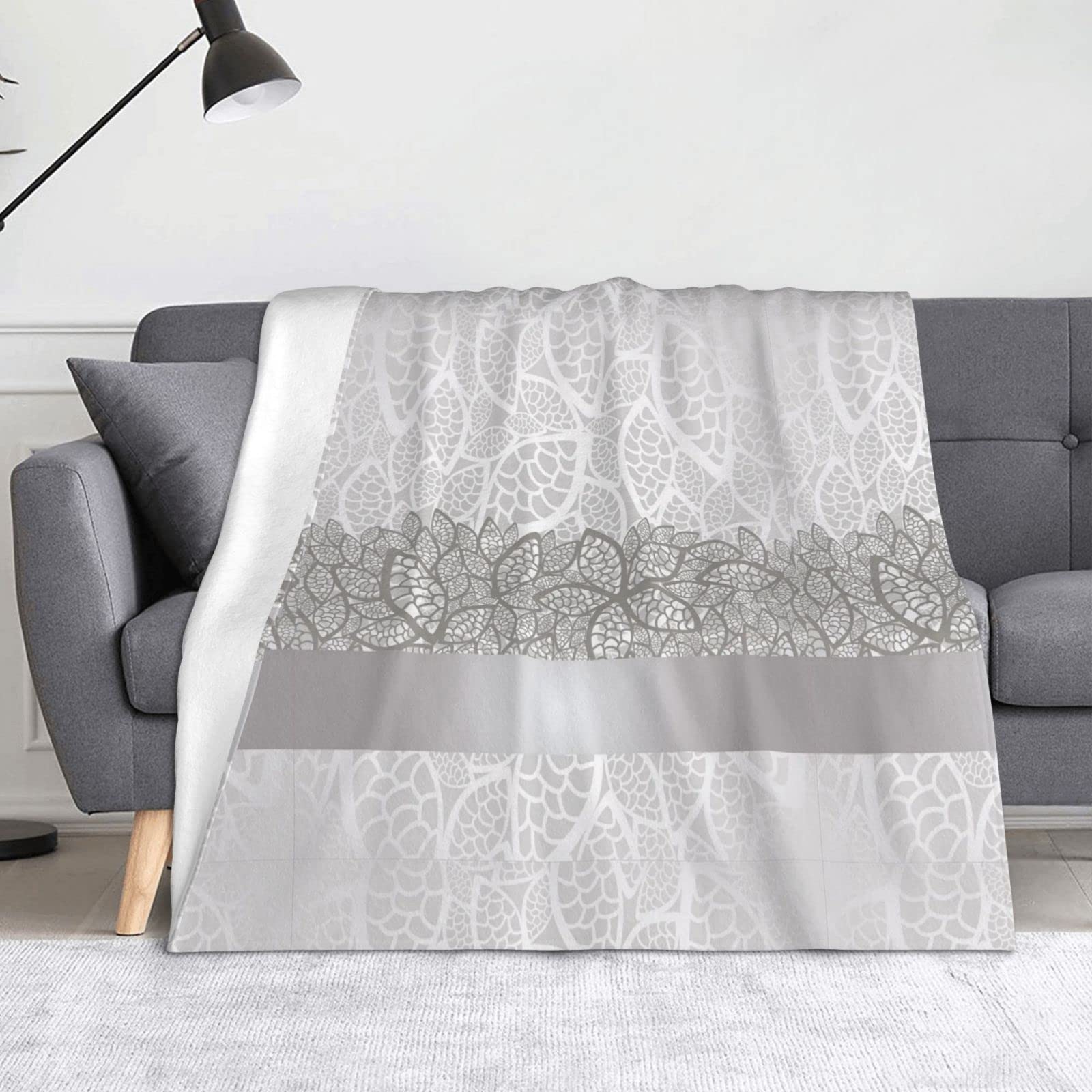 Couverture polaire florale pour vos soirées cocooning au salon
