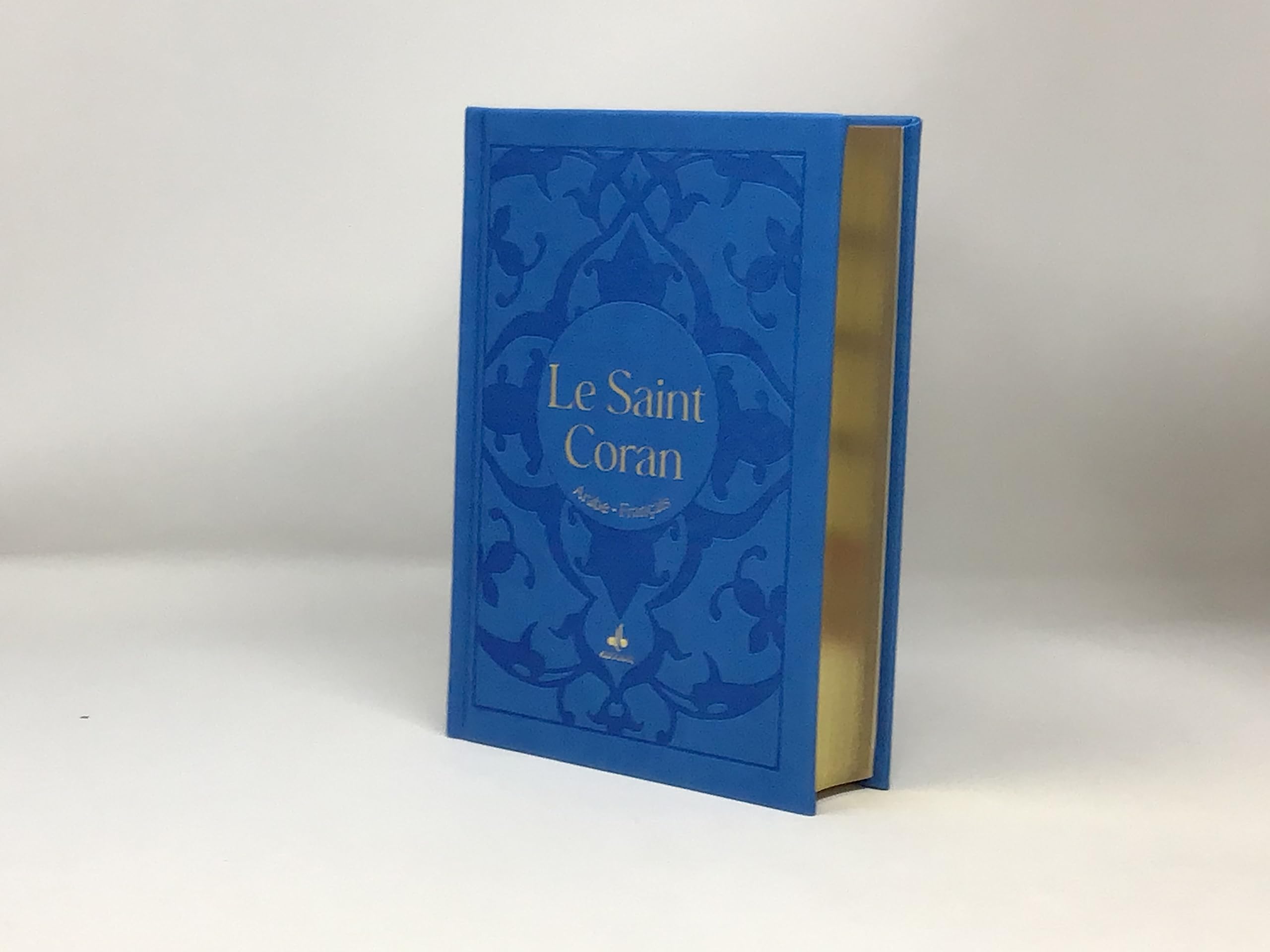 Le Saint Coran et la traduction en langue française du sens de ses versets: Avec dorure, couverture bleu ciel