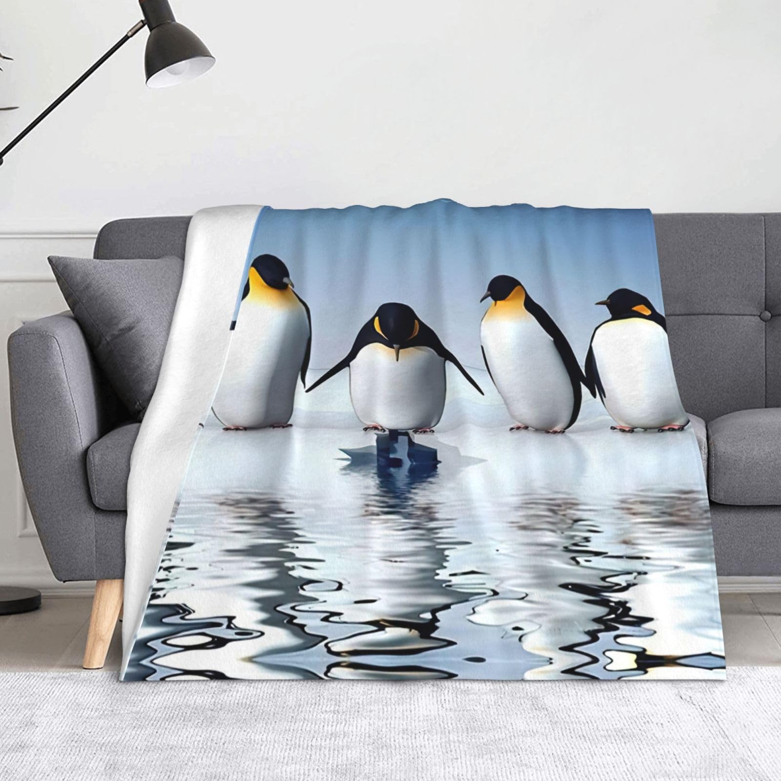Couverture douce pingouin pour vos nuits fraîches en camping et voyage
