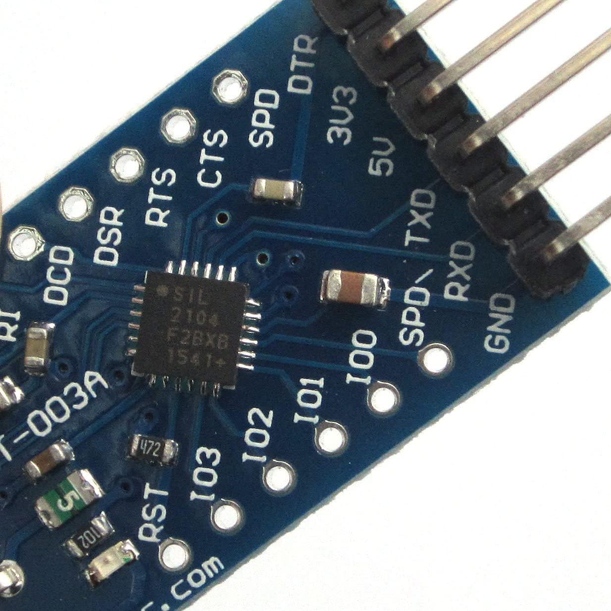 Close-up of WINGONEER CP2104 module pins showing DTR, 3.3V, 5V, TXD, RXD, GND