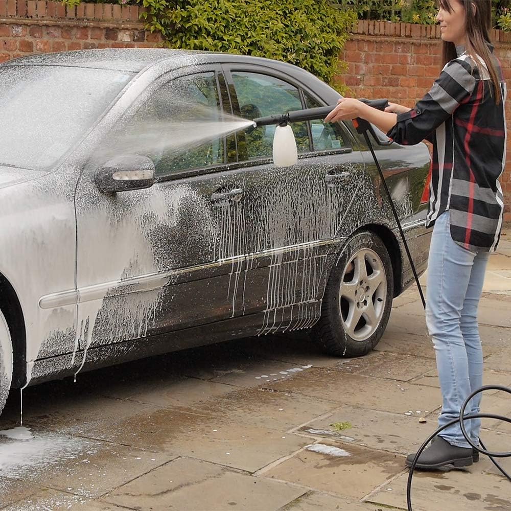 Person applying foam to a car with a pressure washer foam sprayer