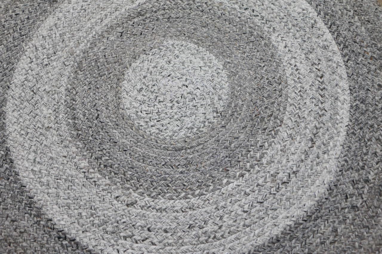 Elevated Earth-Tones Meet Geometric Precision in This Signature Series of sustainably Crafted Jute and Fiber Rugs.