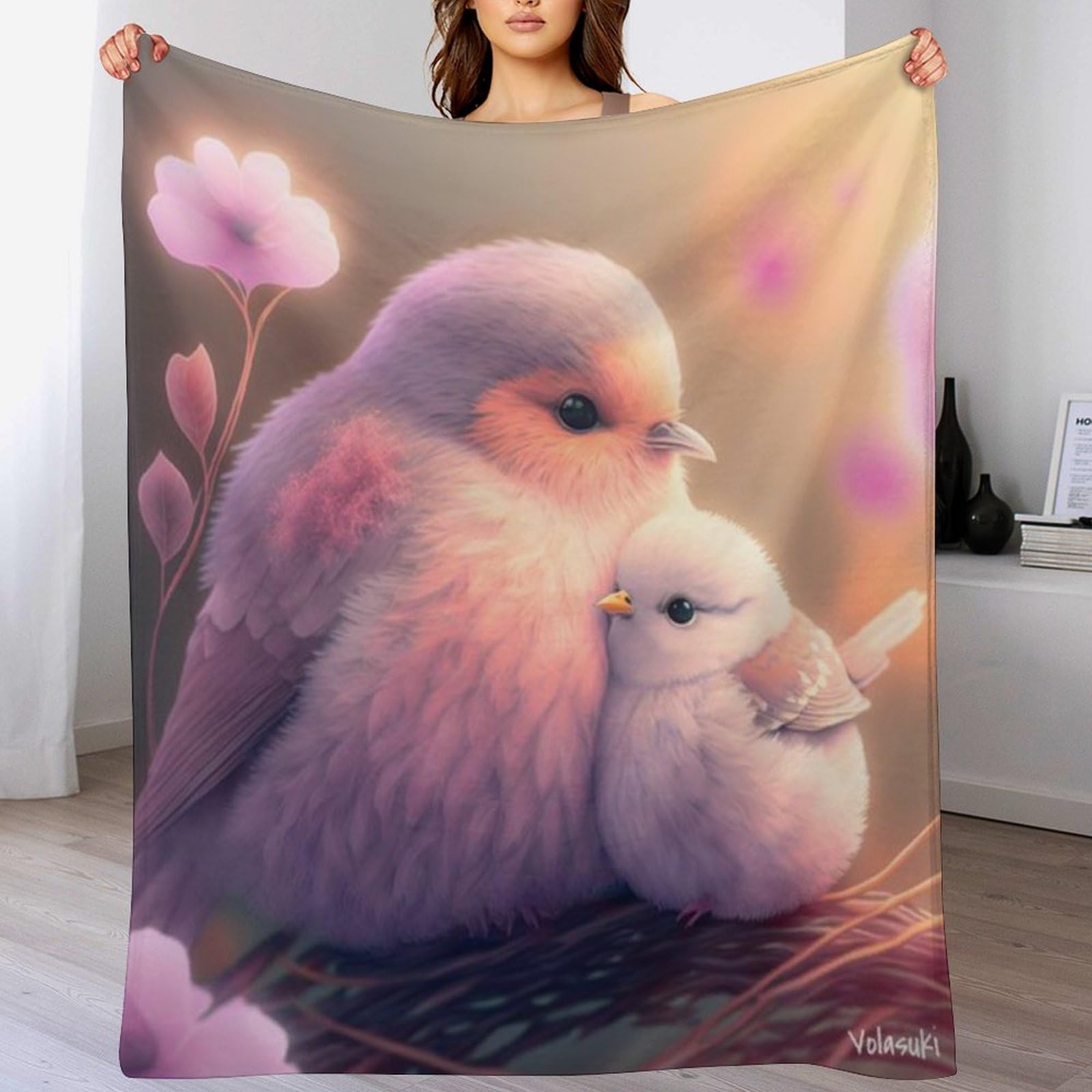 Couverture polaire oiseauie pour des soirees cocooning chaleureuses sur le canape