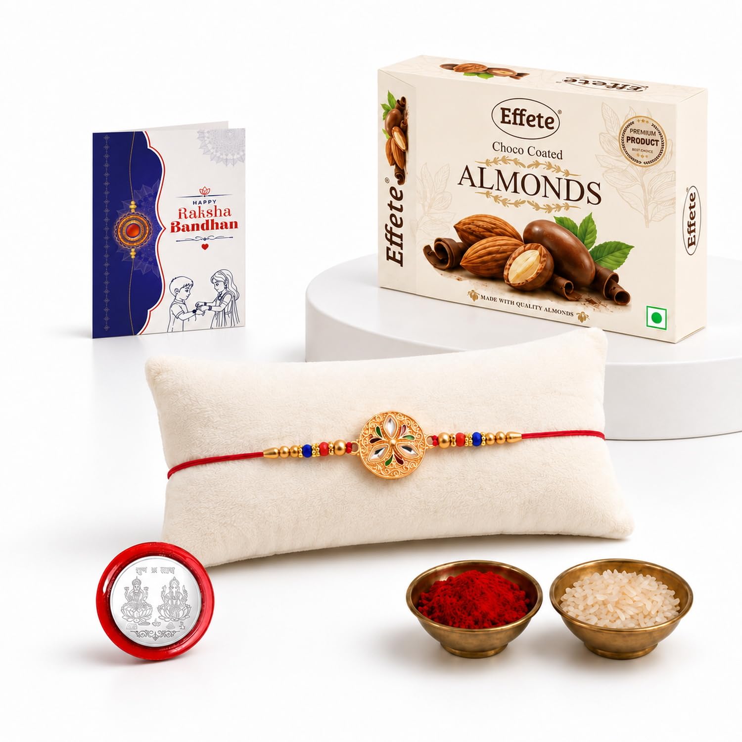 DeoDap Rakhi For Brother Set Of 1 with Effete Chocolate Almonds, Silver Color Pooja Coin, Roli Chawal & Greeting Card