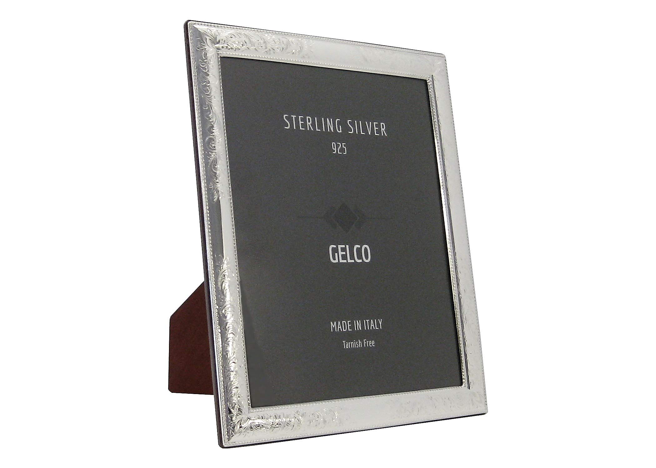 ITALIAN 925 STERLING SILVER WITH WOODEN BACK HAND CHASED GLOSSY FLORAL PICTURE FRAME (8X10)