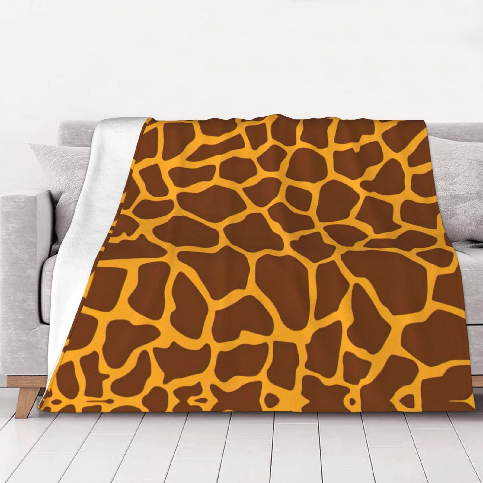 Plaid girafe pour canapé et lit : l'accessoire cocon toutes saisons