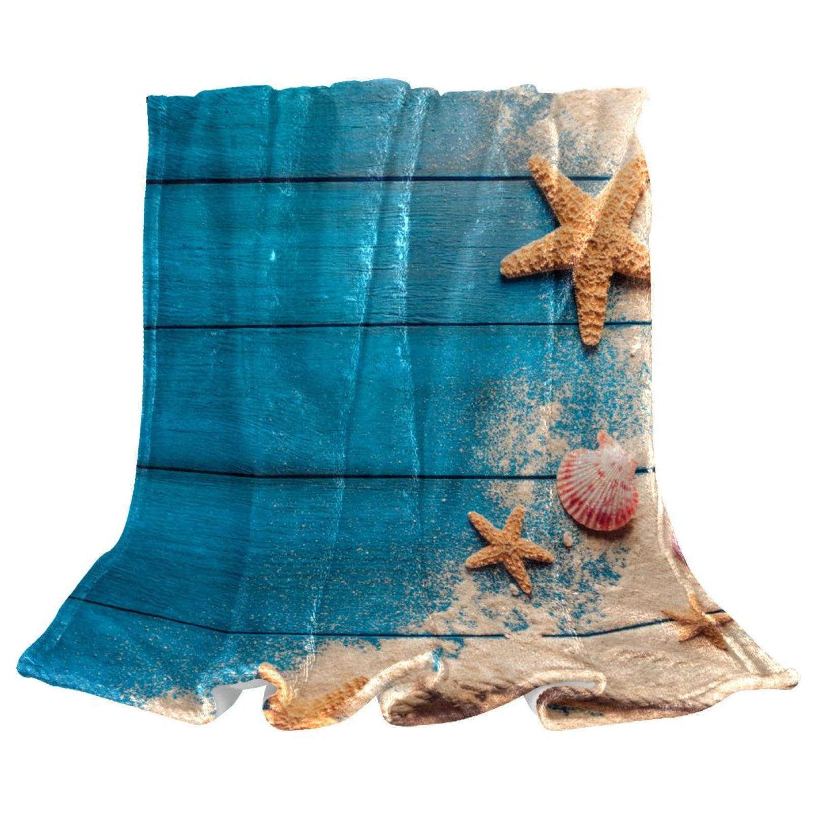 Couverture polaire coquillages douce pour ne plus avoir froid au bureau et au salon