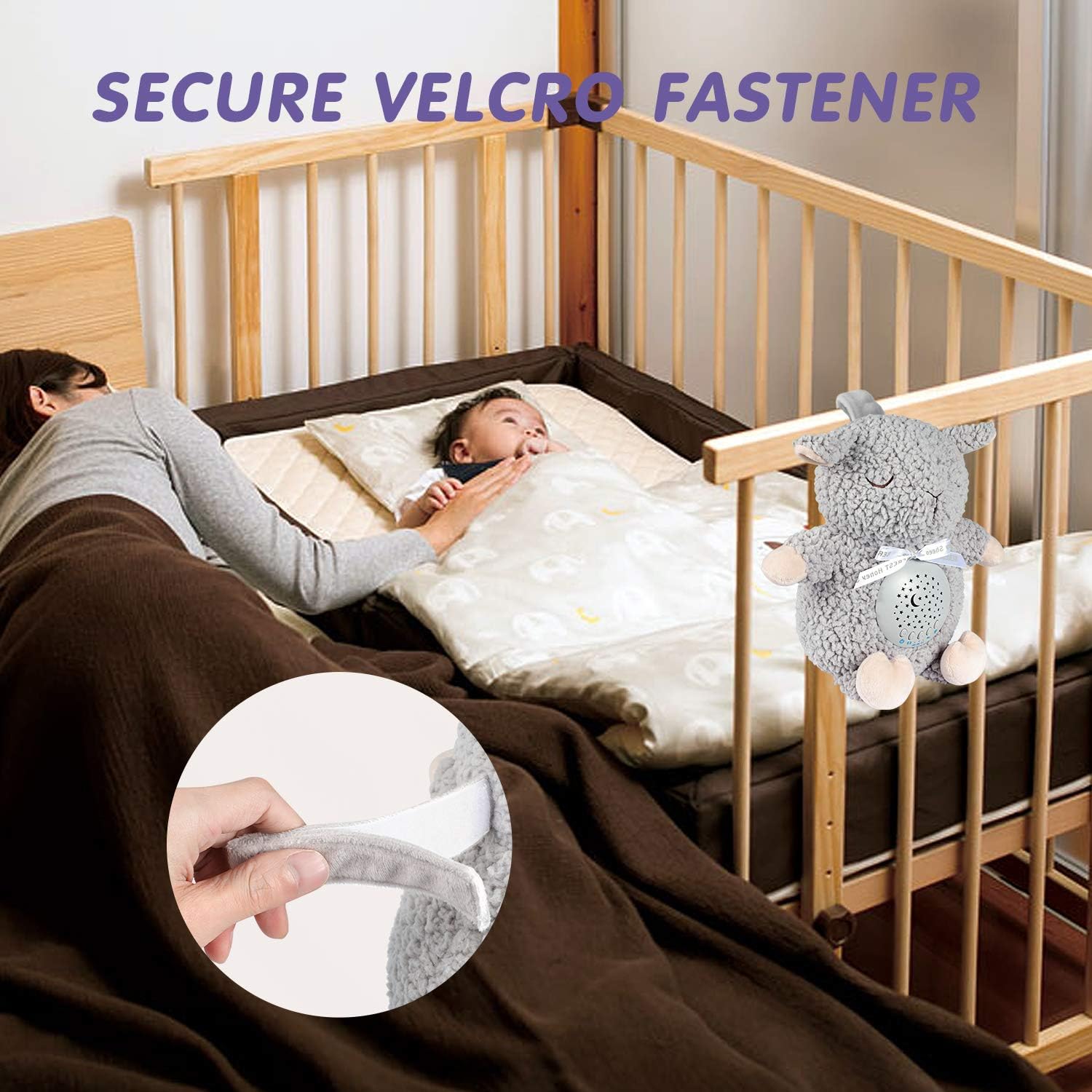 Image showing the BEREST A11-Projector Grey Sheep with its secure Velcro fastener attached to a crib.