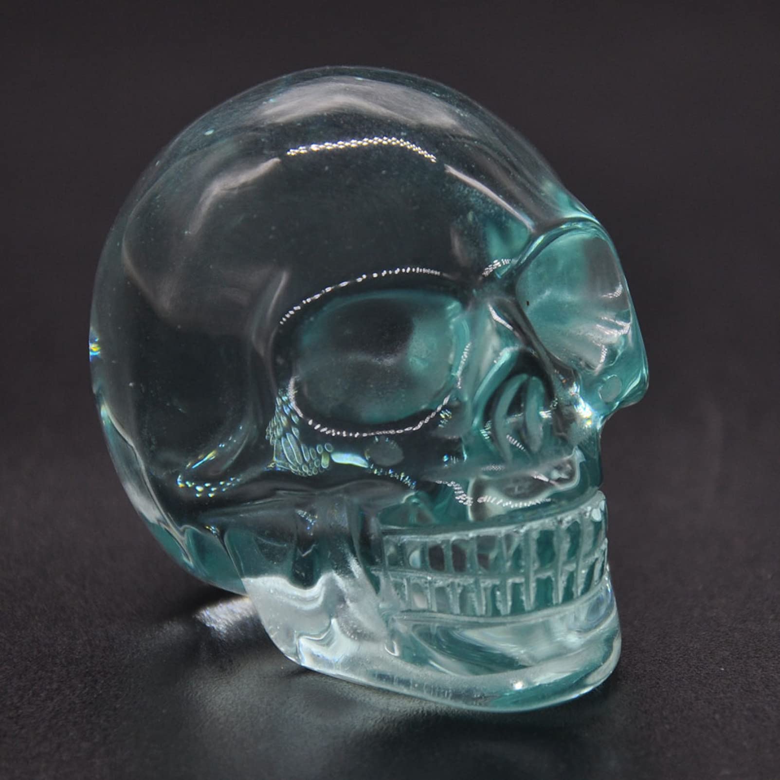 JITEM 1pc Natural Crystal Skull Statues Hand Carved Figurines Sculpture Stone Ornaments Halloween Home Decoration Gift kuanbao (Color : Ocean Blue Obsidian, Size : 1pc 1.97 * 1.26 * 1.42in)