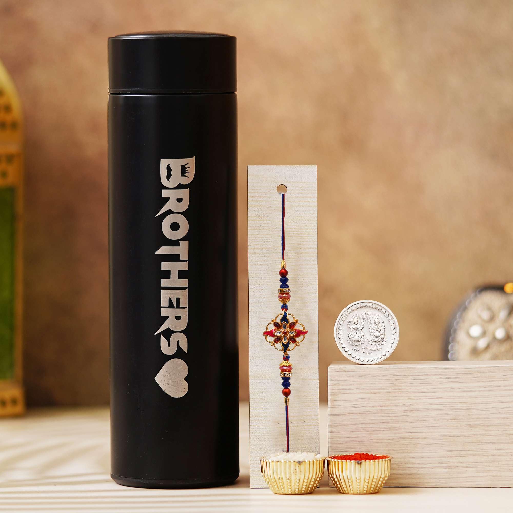 Dunkastons Designer Rakhi Combo Set for Brother Includes Rakhi, Temperature Bottle, Mini Greeting Card, Roli Chawal, and Laxmi Ganesh Coin Perfect Rakhi Gift for Brother (S2) (B0DC3XQ82Y) Amazon Price History, Amazon Price Tracker