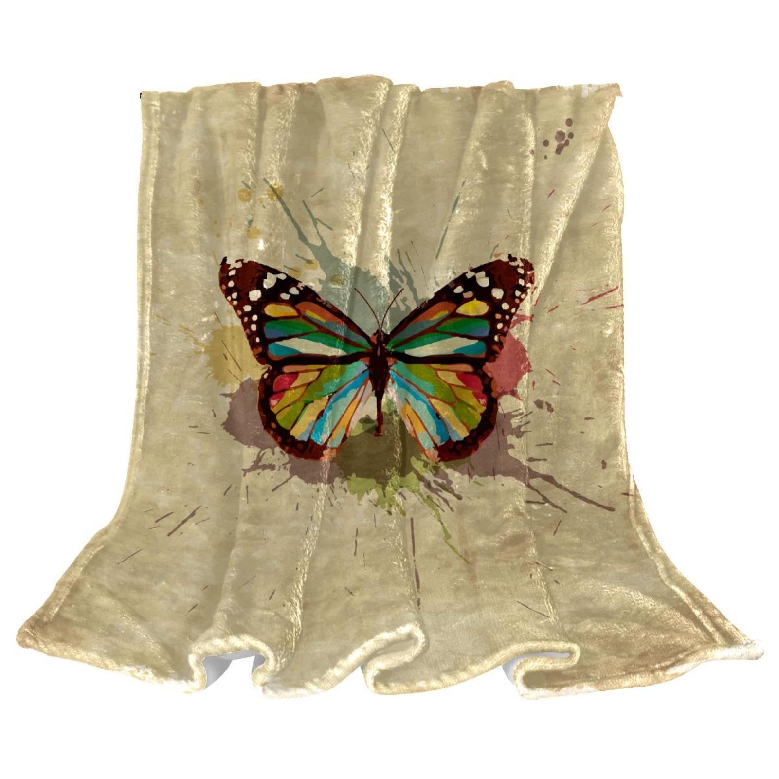Couverture polaire papillon vintage idéale pour vos soirées cocooning au salon