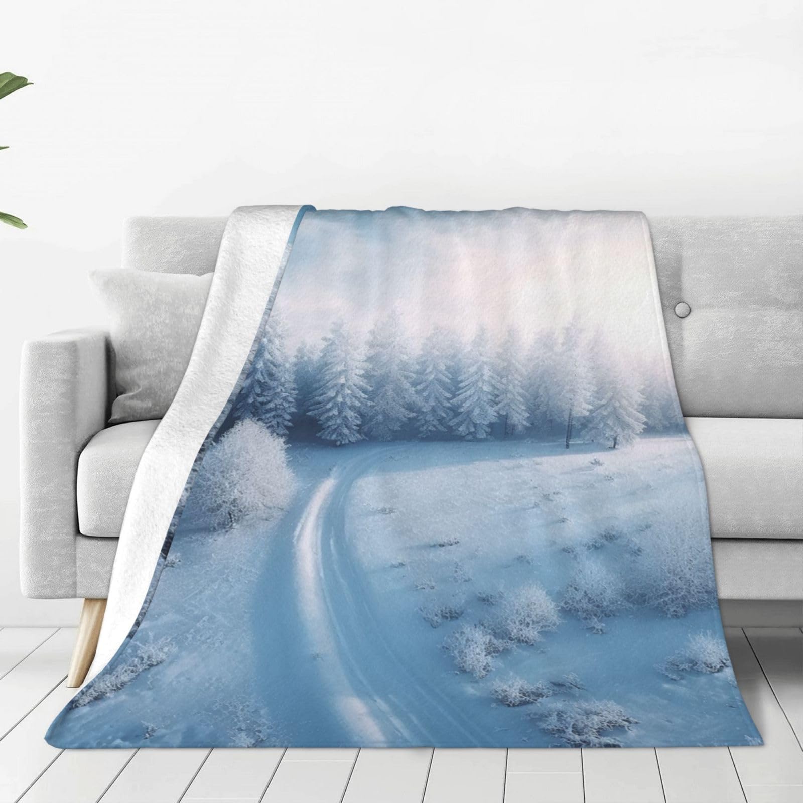 Couverture en micro polaire imprimée d'hiver pour un canapé cocooning