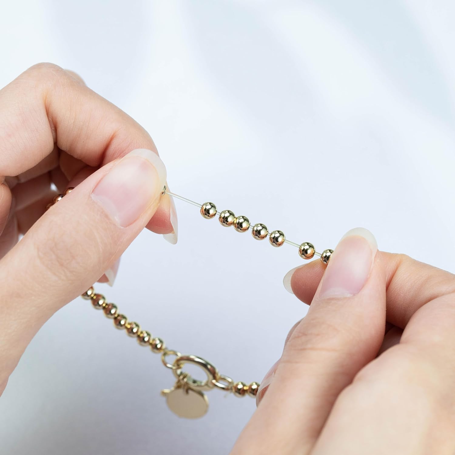 Free bird Cross Birthstone Bracelet | Dainty 14K Gold Plated Cross Charm Bracelet for Women | Stretchable Elastic Gold Beaded Bracelet | Stackable Trendy Birthstone Bracelet | Jewelry Gifts for Women - Image 4