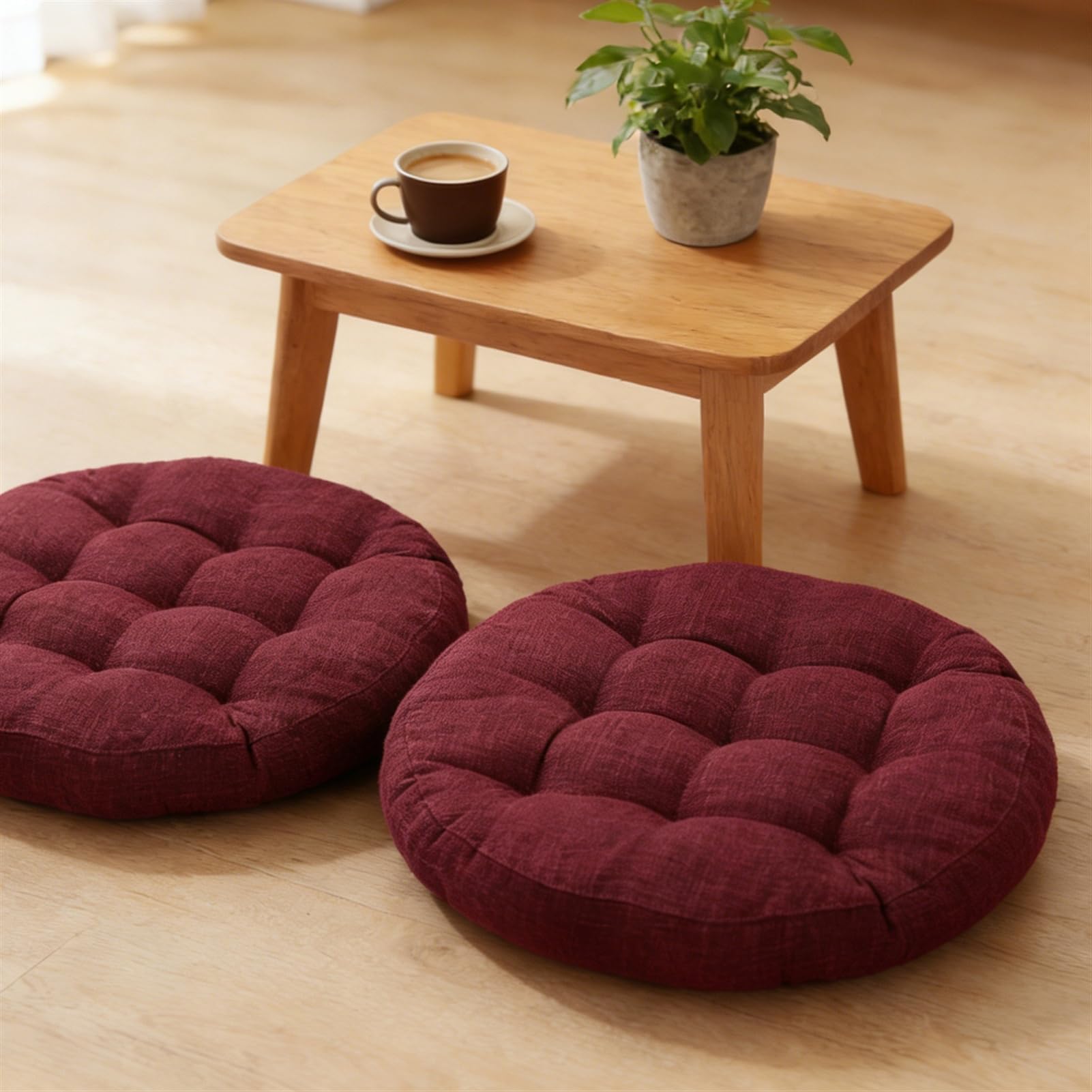 Coussin de méditation rouge vin pour créer un coin détente zen dans votre salon