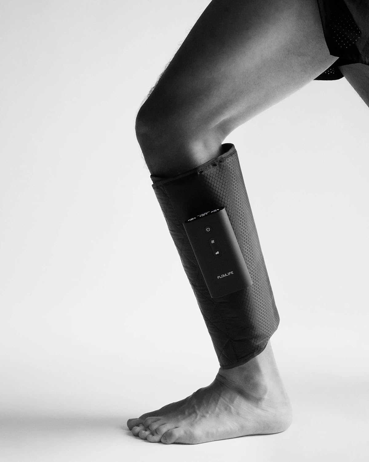 User wearing one Flowpression Calf Cuff on the leg