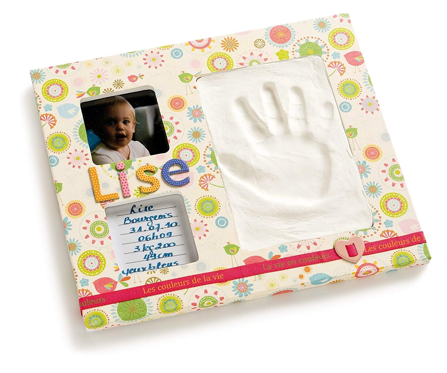Cadre photo pour bébé blanc au salon pour revivre ses premiers pas