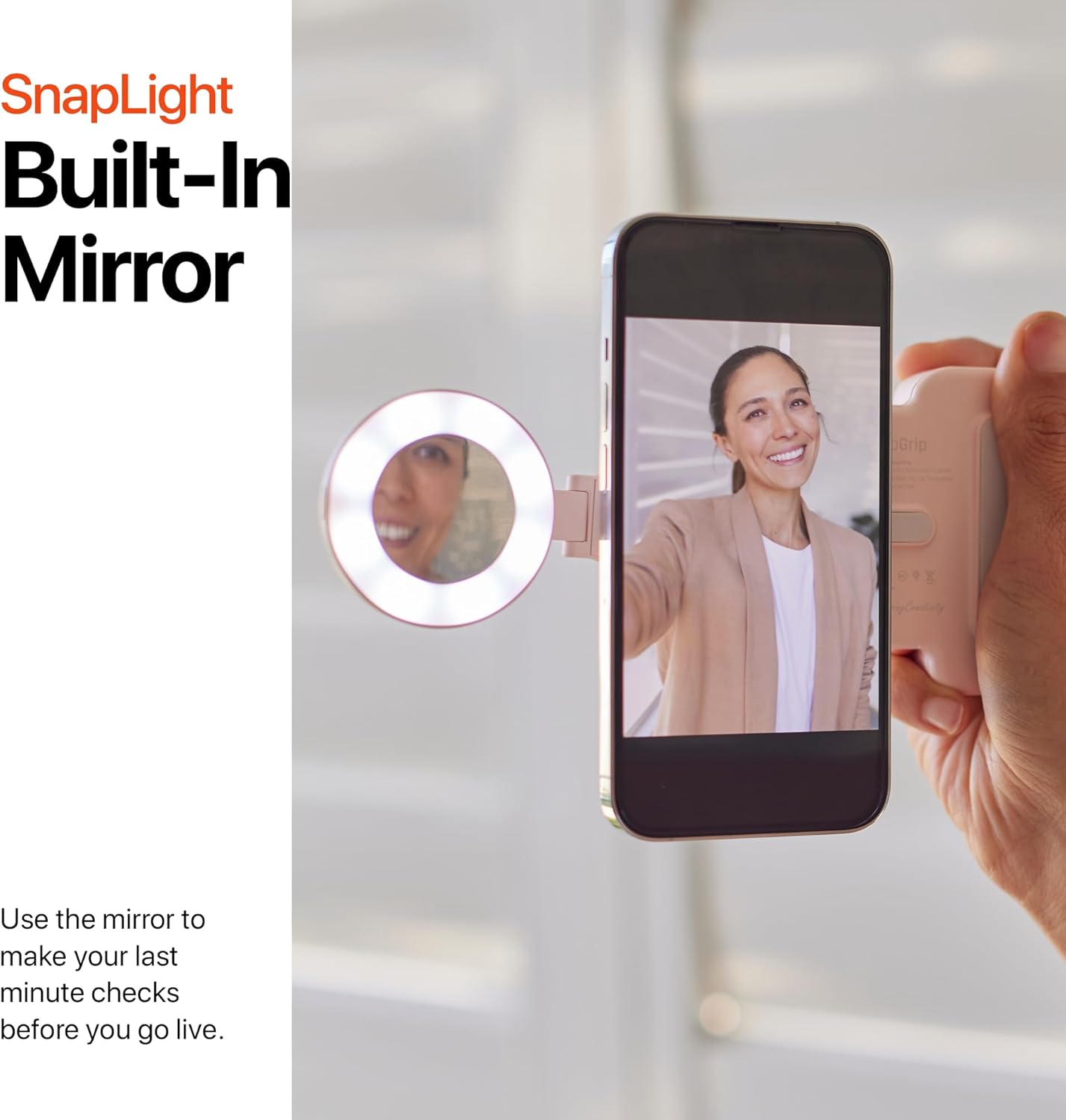 ShiftCam SnapLight with its built-in mirror, used by a person to check their appearance before a selfie.