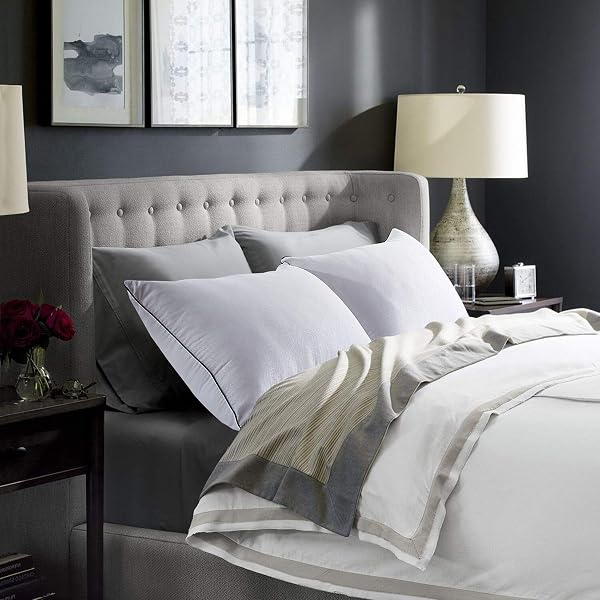 Close-up of the JOLLYVOGUE pillow showing the micro polyester fiber fill and reinforced stitching.