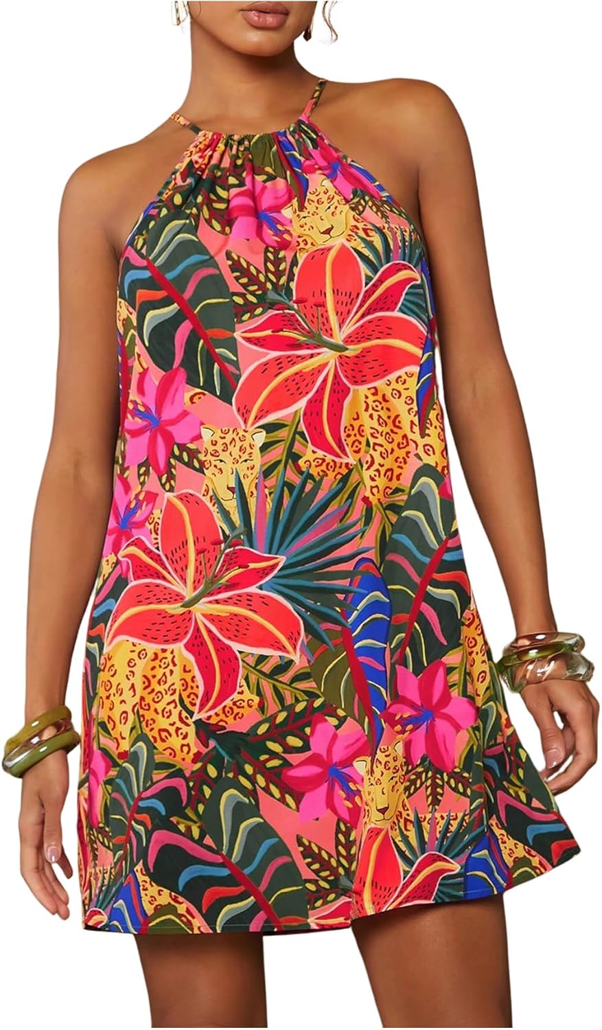 Tropical print halter dress for women’s summer holiday wear.