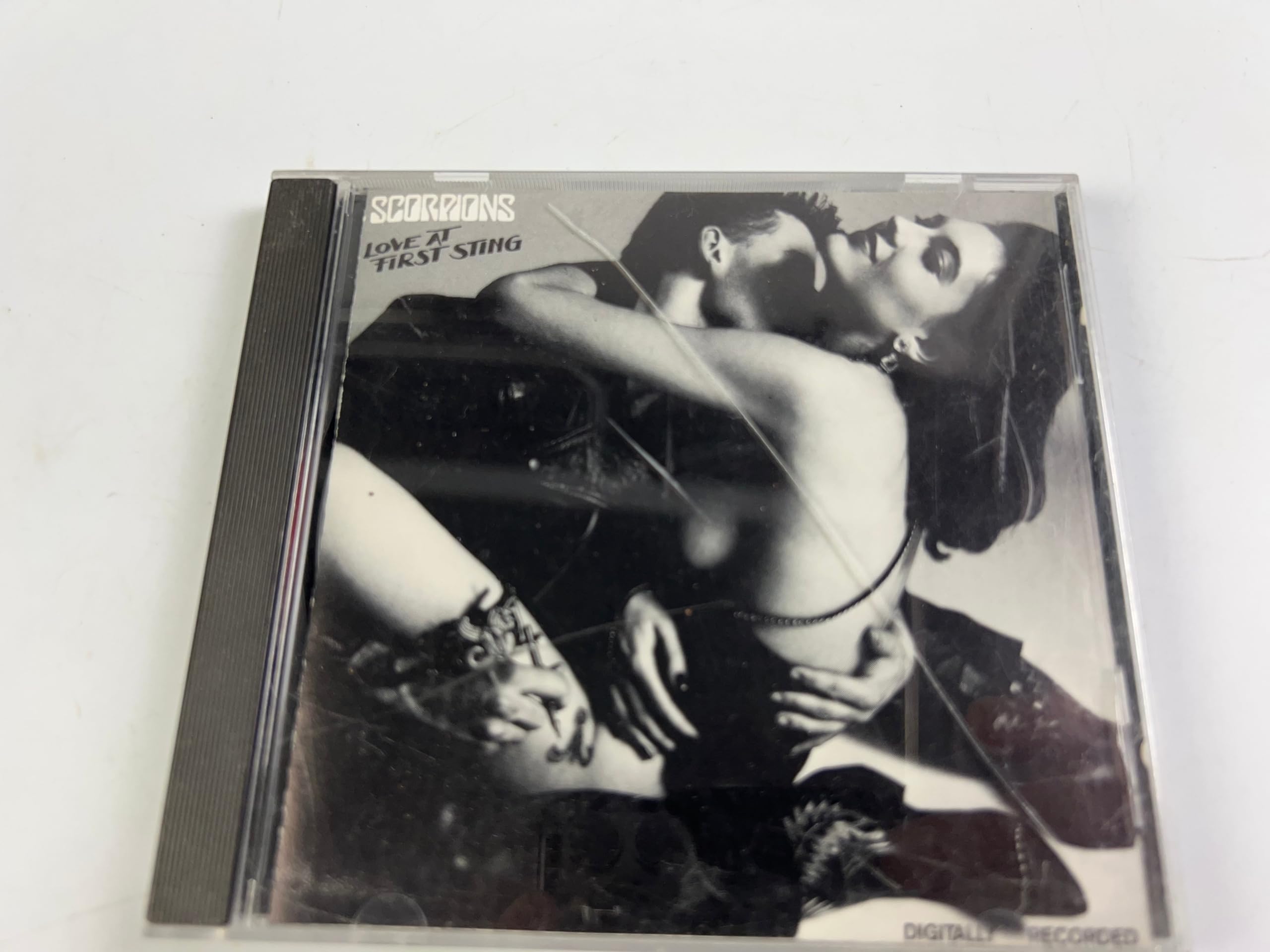 Love at First Sting [Audio CD]